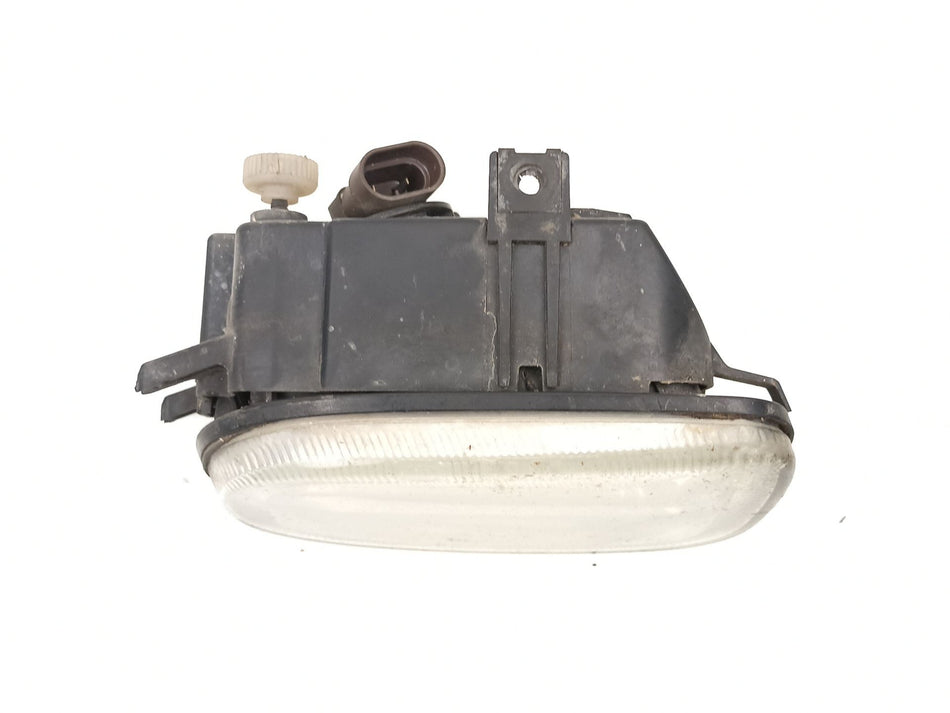 Farol de nevoeiro esquerdo | Nissan Almera II Hatchback (N16)