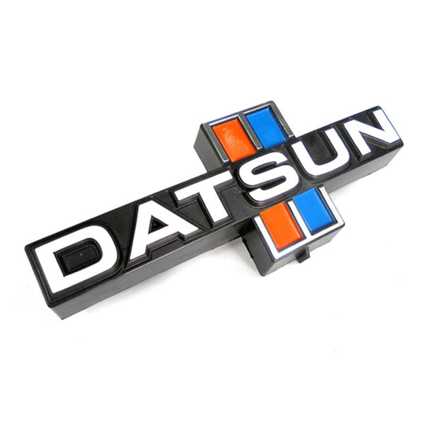 Emblema grelha frontal | Nissan