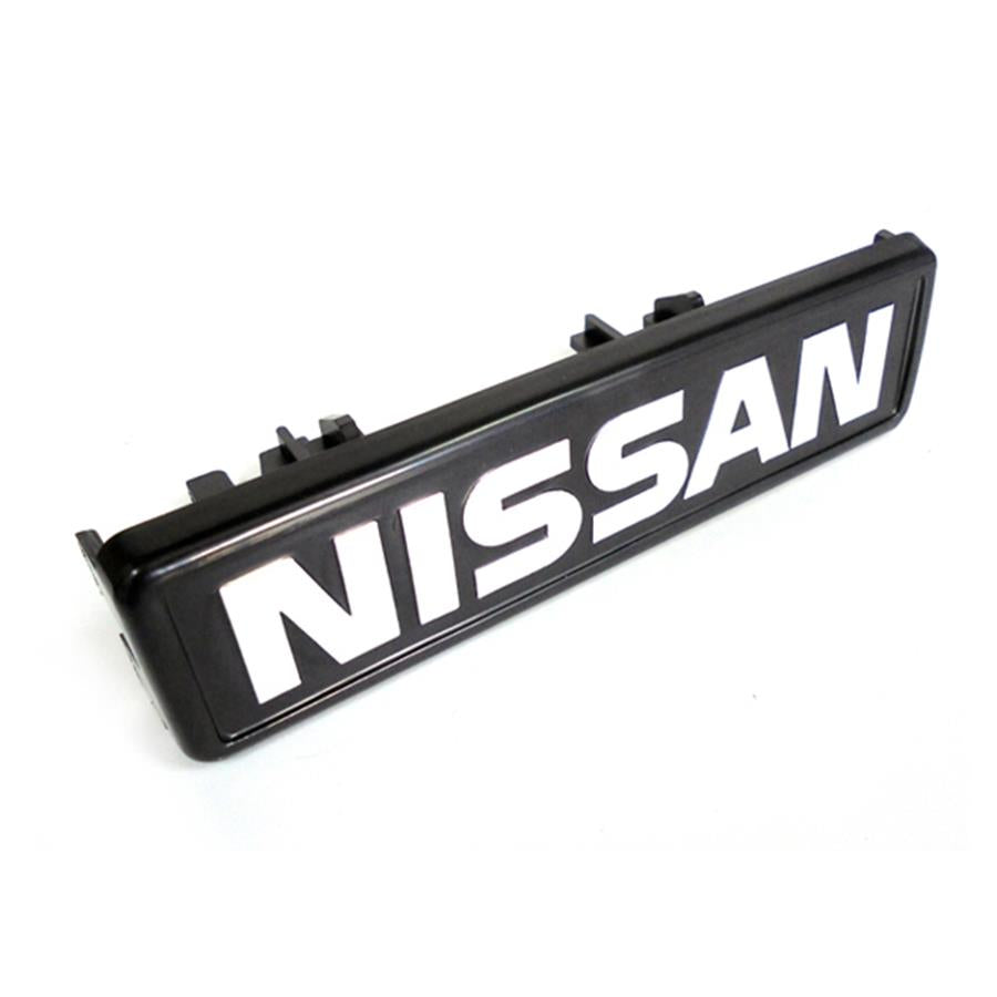 Emblema grelha frontal | Nissan
