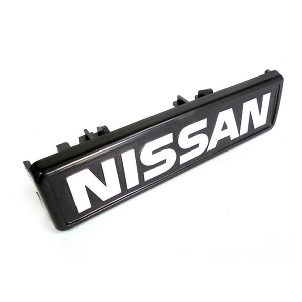Emblema grelha frontal | Nissan